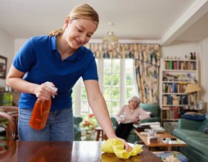 home care professional helping with cleaning